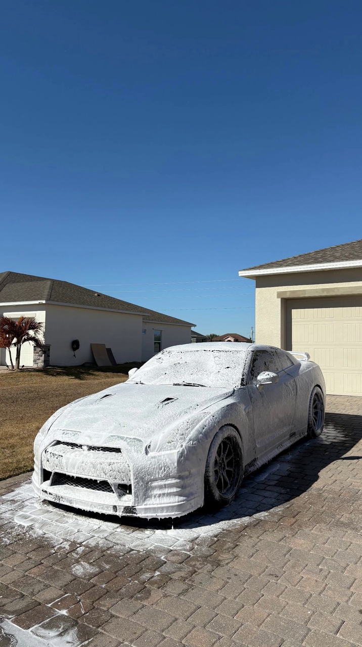 White GTR driveway exterior detail